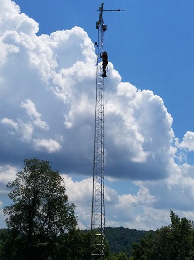 Bekah climbing the 20m methane monitoring tower
